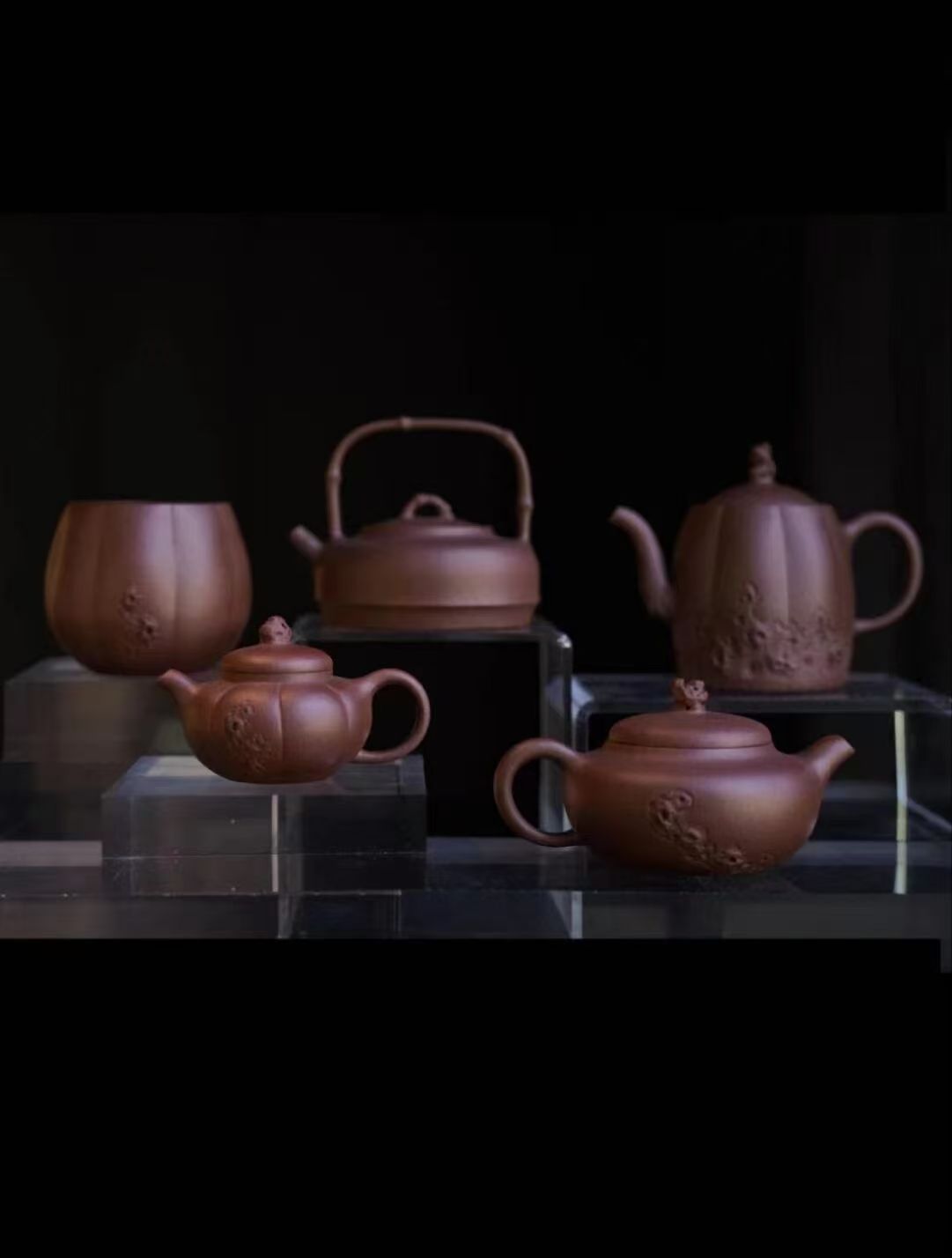 A grouping of Xiang Feng's teapots